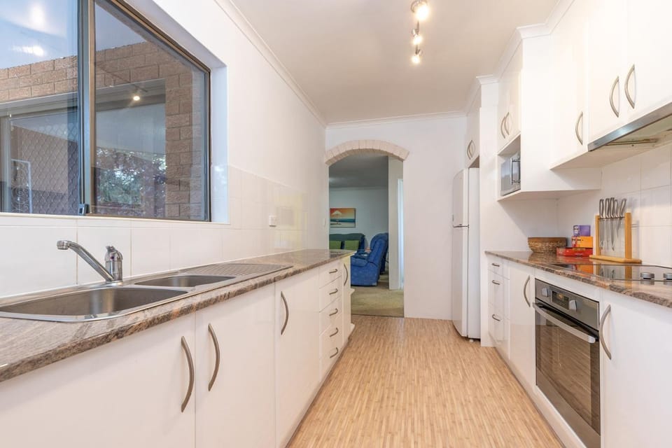 Kitchen or kitchenette, oven, stove