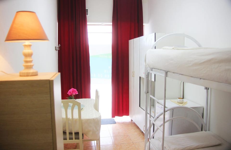 Dining area, bunk bed, air conditioner