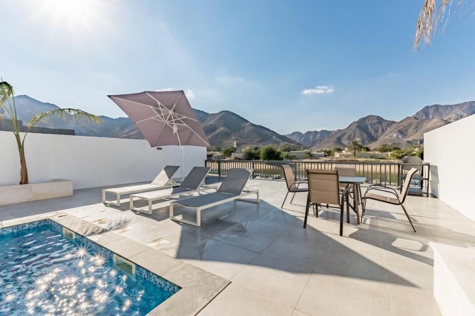 Patio, Nearby landmark, Spring, Natural landscape, View (from property/room), Balcony/Terrace, Mountain view, Pool view, Swimming pool, sunbed