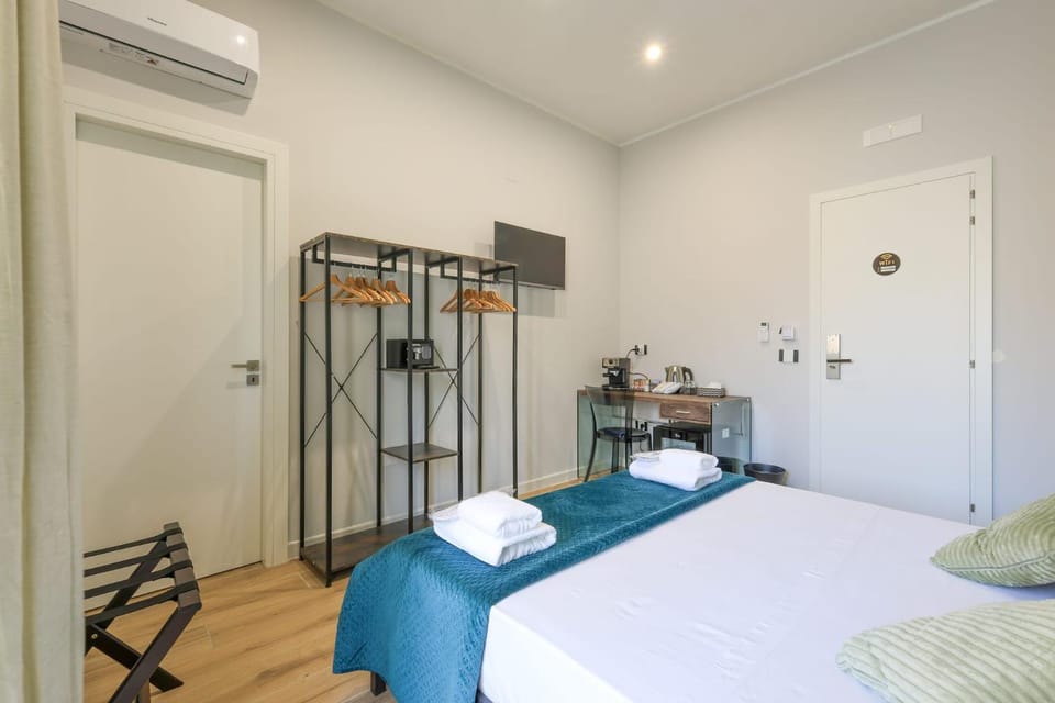 Bed, Photo of the whole room, Bedroom, hair dresser, towels, wardrobe, air conditioner