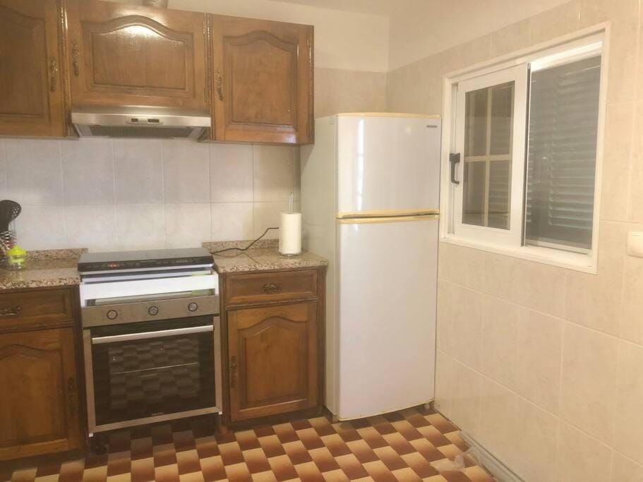 Kitchen or kitchenette, oven, stove
