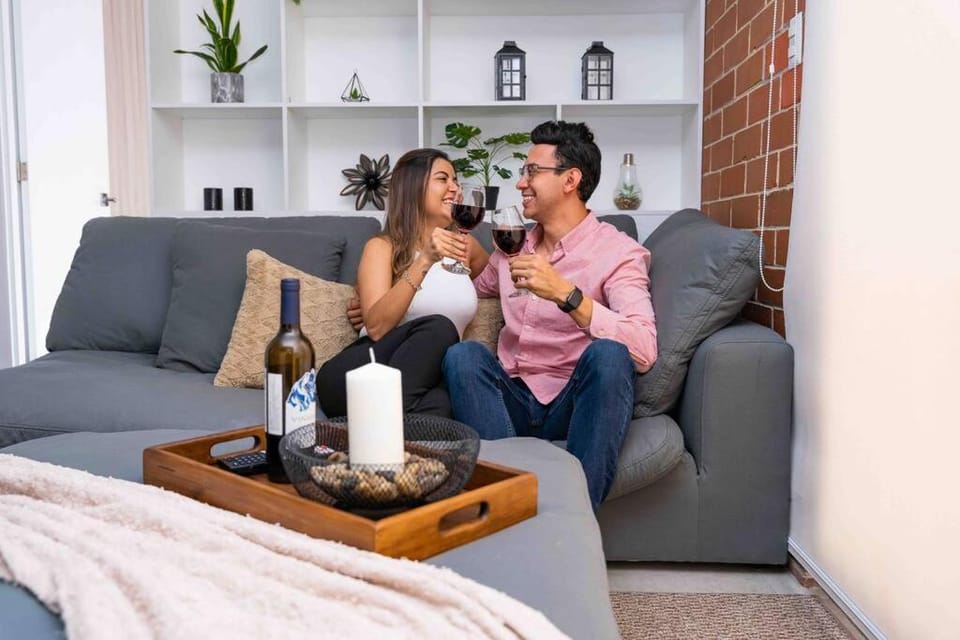 Living room, Food and drinks, Seating area, Guests, Drinks