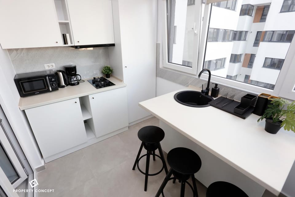 Coffee/tea facilities, Kitchen or kitchenette, Dining area, minibar, stove, toaster