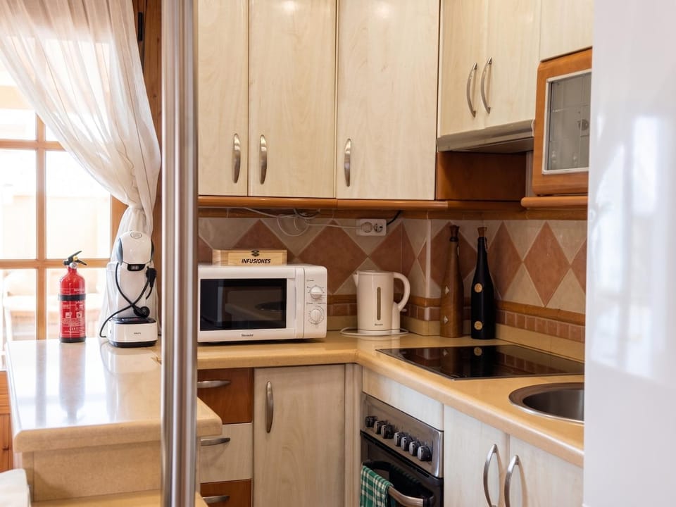 Kitchen or kitchenette, toaster