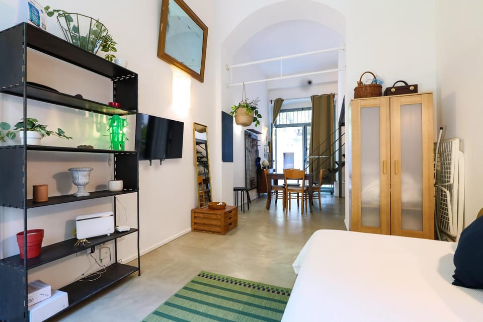 Bed, Living room, Seating area, Bedroom