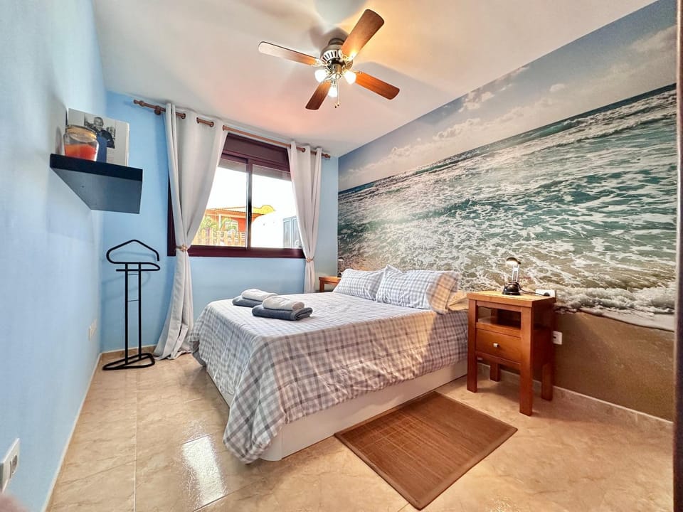 Bed, Photo of the whole room, Bedroom, fireplace, towels
