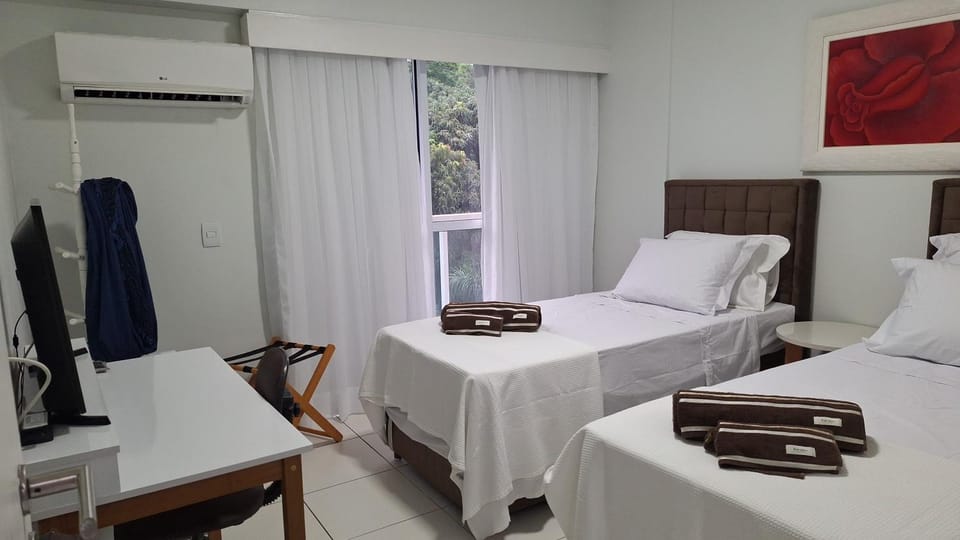 Bed, Photo of the whole room, towels, air conditioner