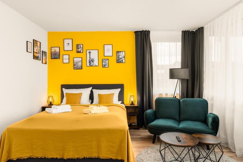 Bed, Living room, Seating area, Bedroom