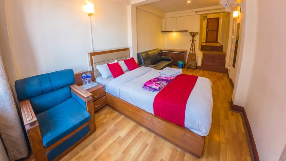 Bed, Seating area, Bedroom