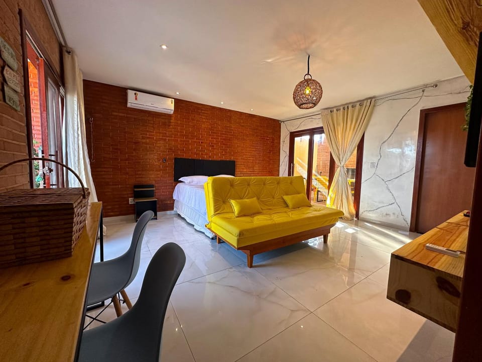 Bed, TV and multimedia, Seating area, Bedroom, air conditioner