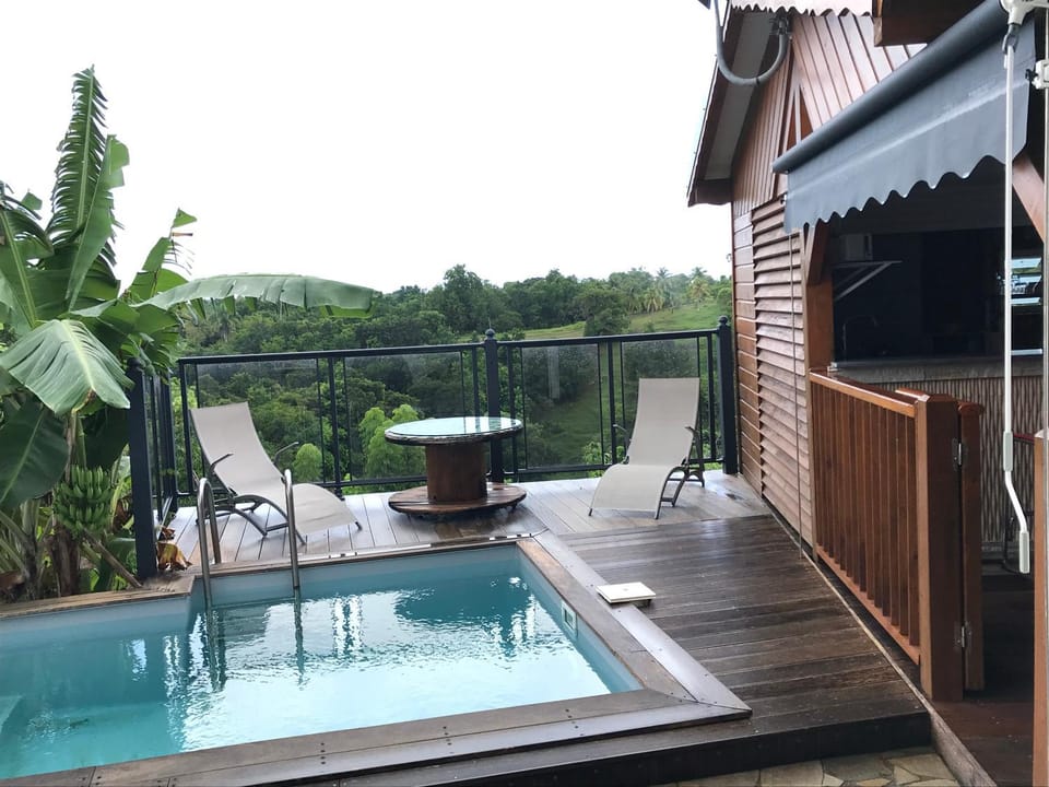 Natural landscape, View (from property/room), Garden view, Swimming pool, sunbed