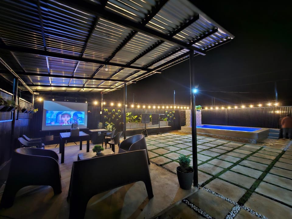 Patio, Communal lounge/ TV room, Night, Pool view, Swimming pool