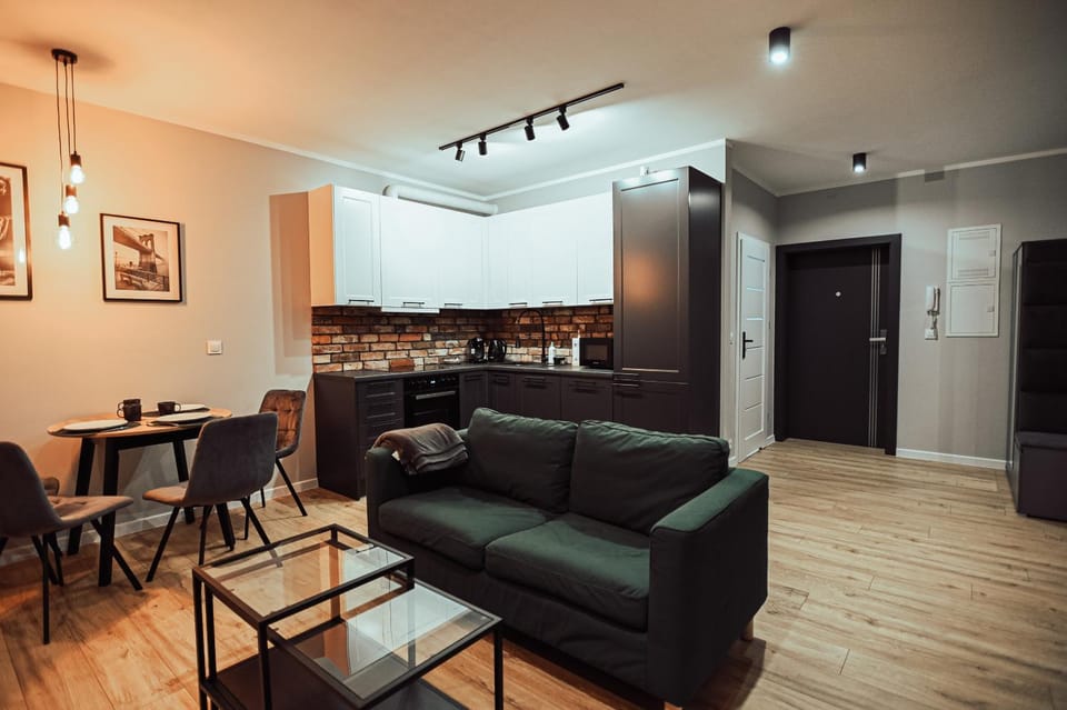 Kitchen or kitchenette, Living room, Seating area, Dining area