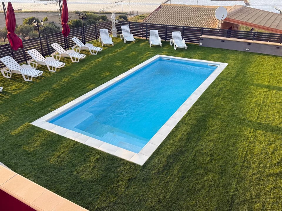 Property building, Living room, Swimming pool