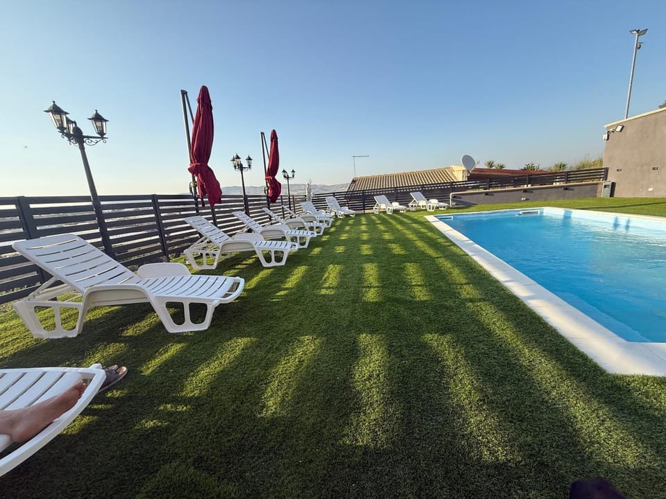 Property building, Balcony/Terrace, Living room, Swimming pool