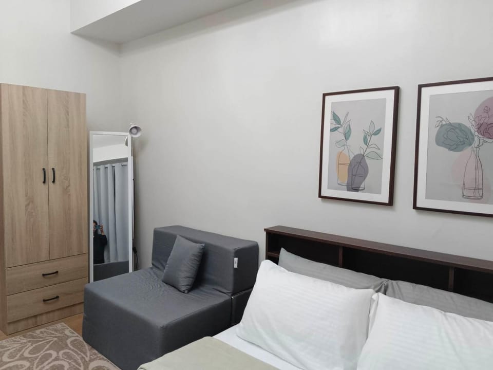 Bed, Living room, Seating area, wardrobe