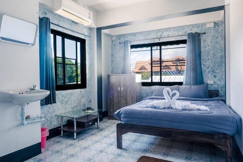 Photo of the whole room, Bedroom, towels, air conditioner