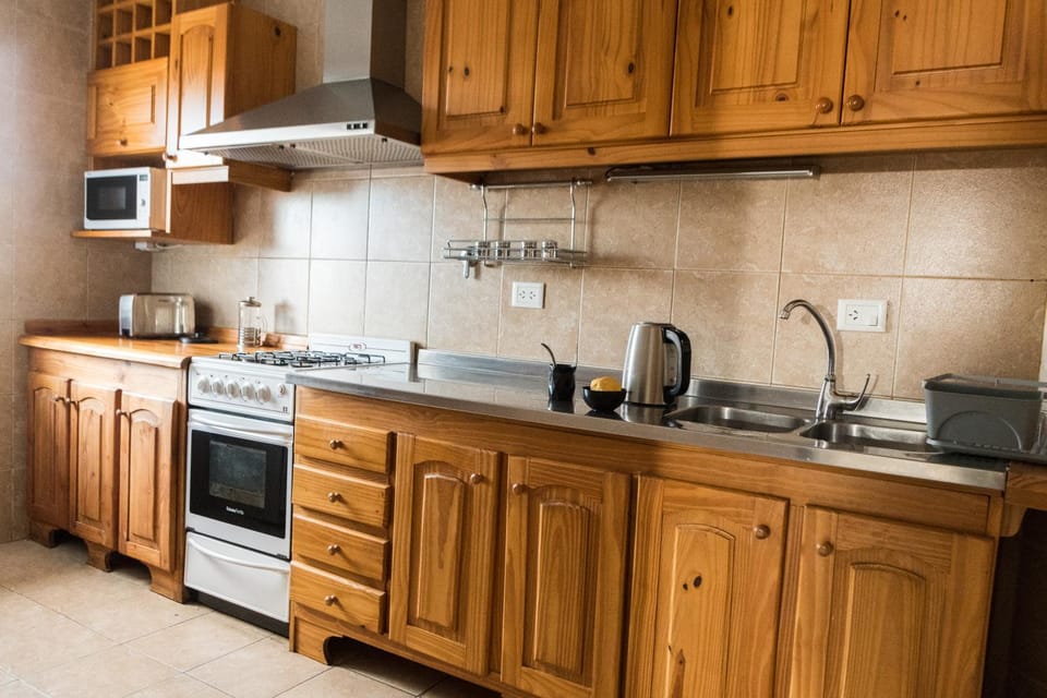 Kitchen or kitchenette, stove, toaster