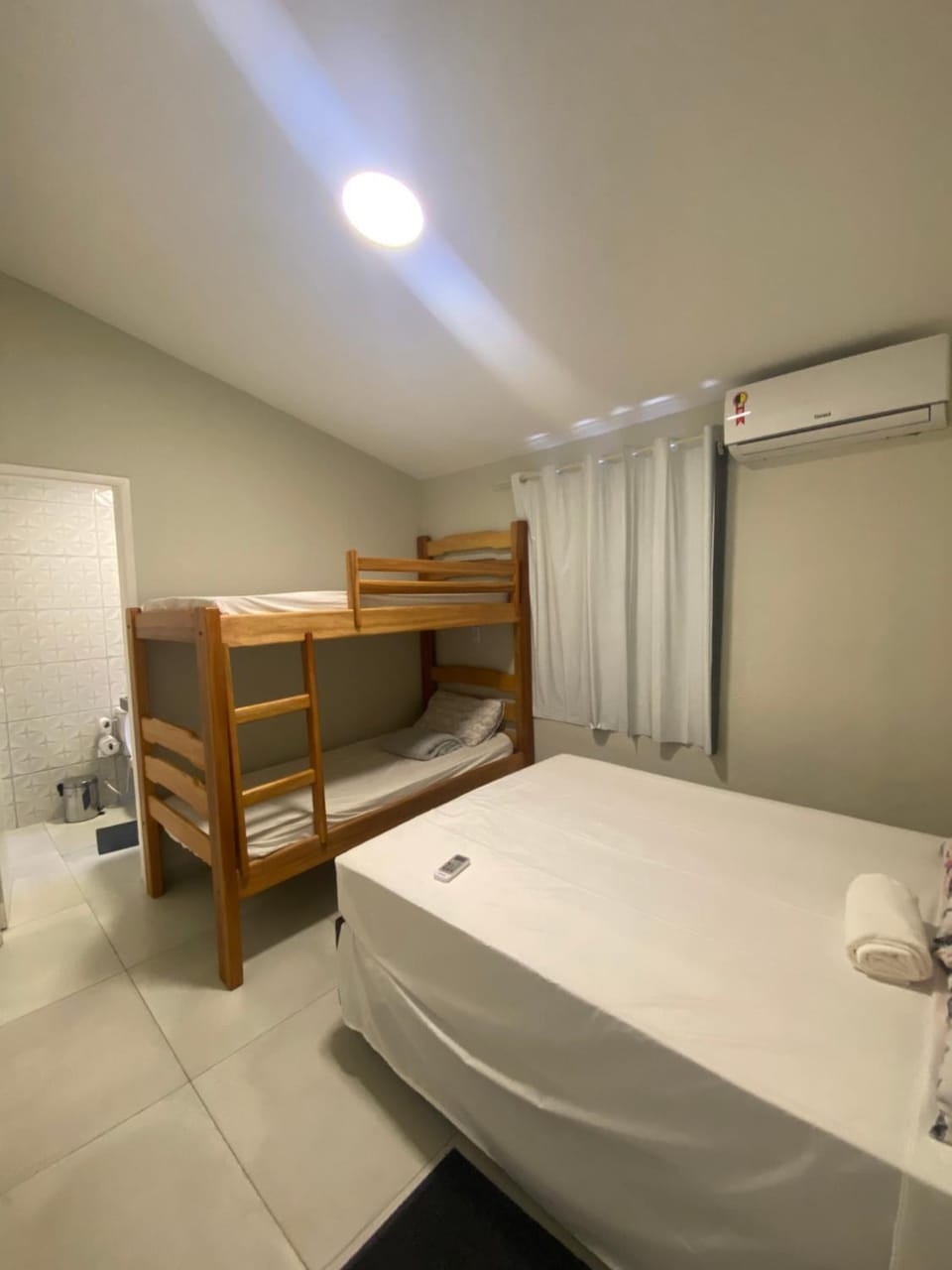 Bed, Photo of the whole room, Bedroom, bunk bed, towels, air conditioner