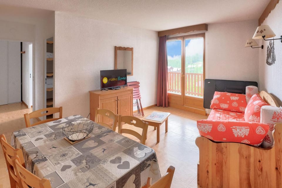 Bed, fireplace, kitchen