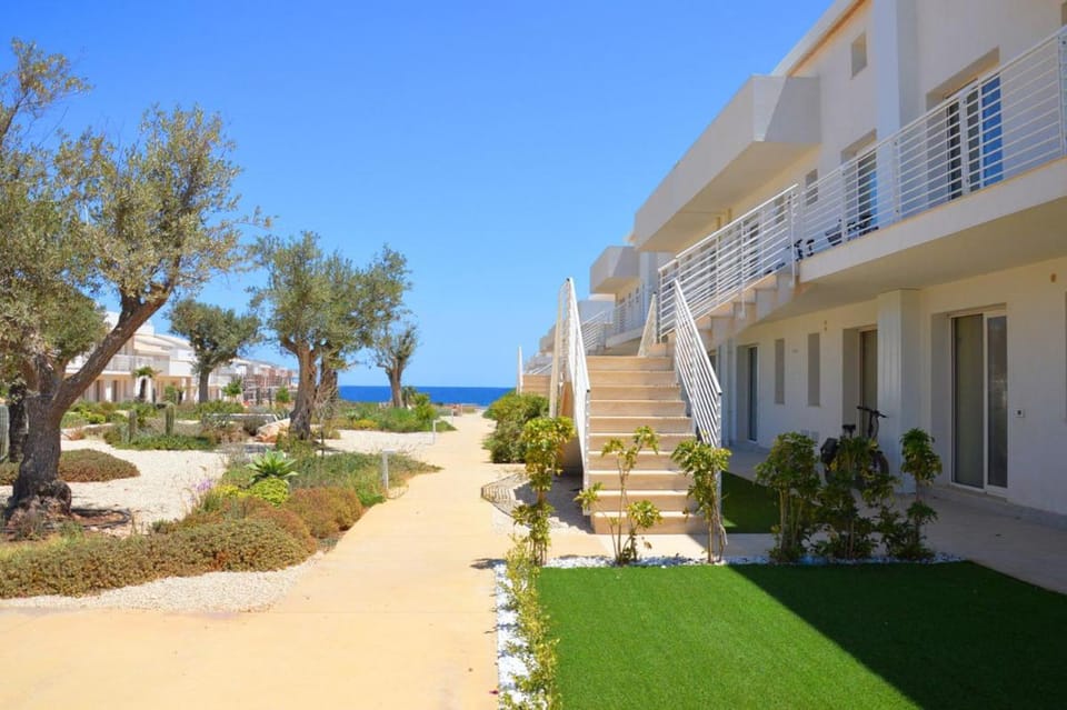 Property building, Natural landscape, View (from property/room), Balcony/Terrace, Beach