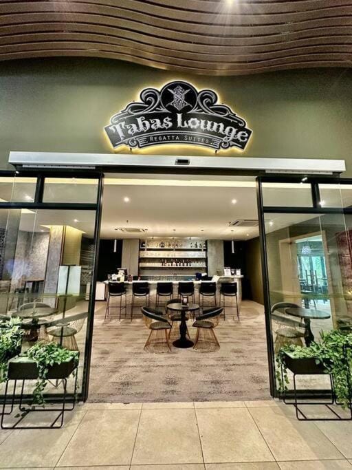 Restaurant/places to eat, Seating area, Logo/Certificate/Sign, Text overlay, Certificate/Award