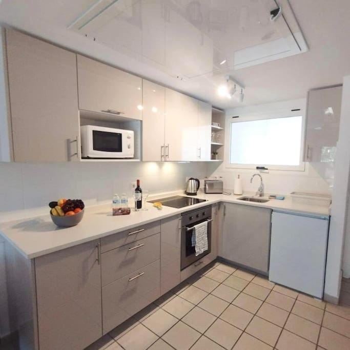 Kitchen or kitchenette, oven, stove, toaster