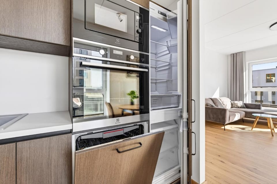 Kitchen or kitchenette, dishwasher, microwave, oven