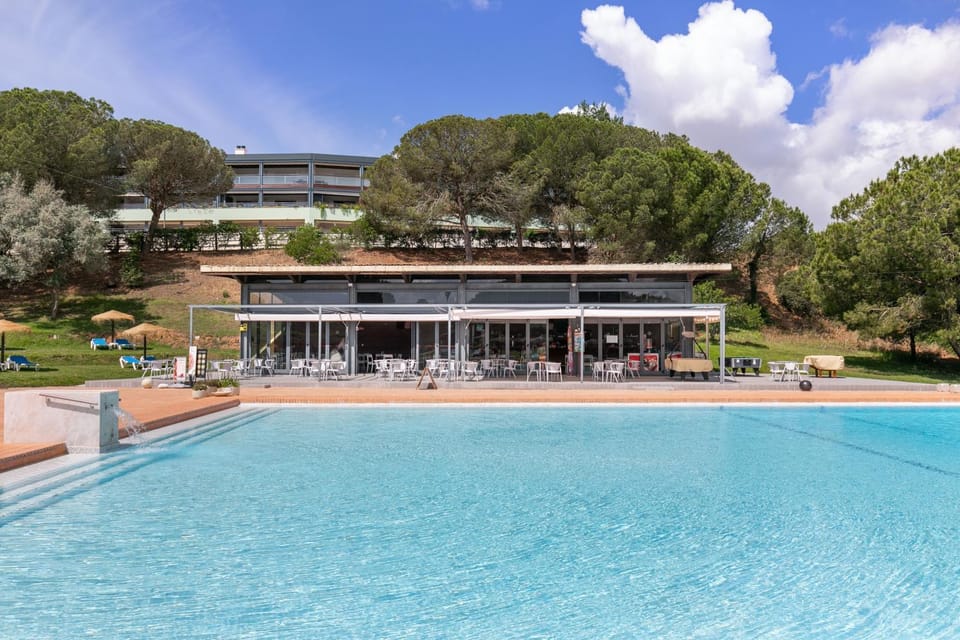 Property building, Living room, Swimming pool