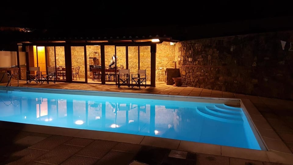 Property building, Living room, Swimming pool