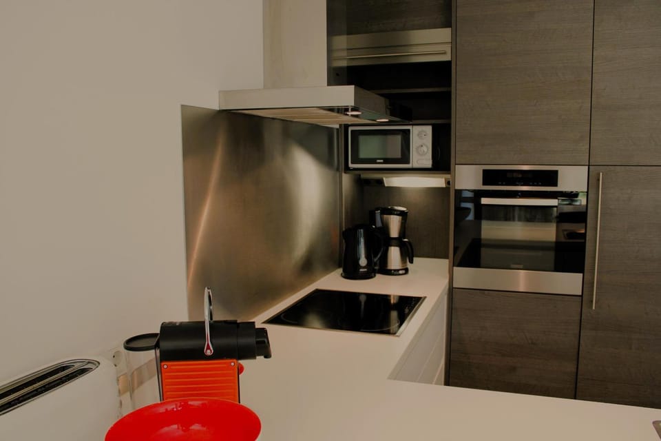 Kitchen or kitchenette, oven, toaster