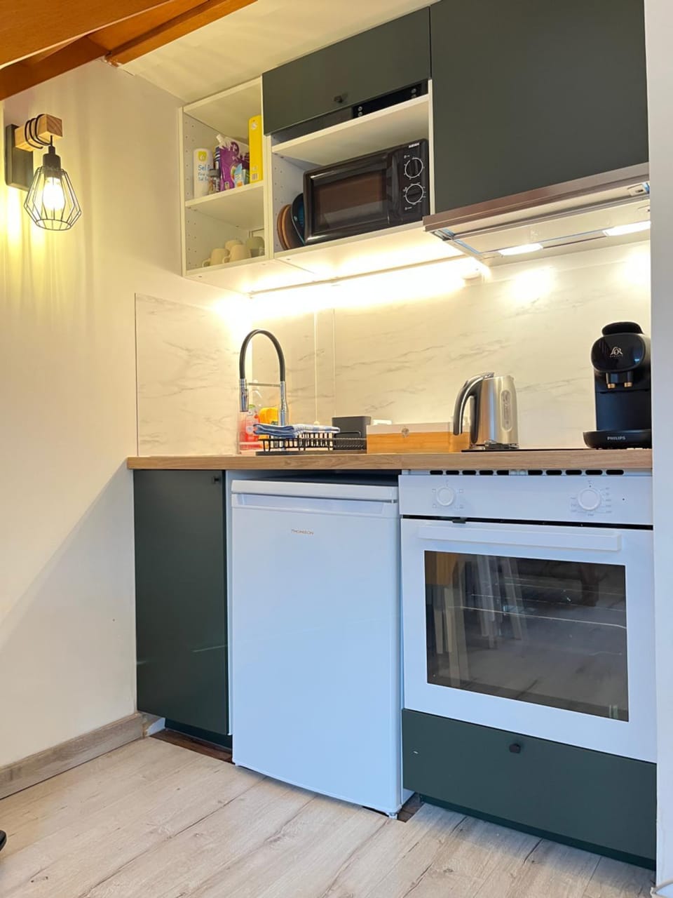 Kitchen or kitchenette, oven, stove, toaster