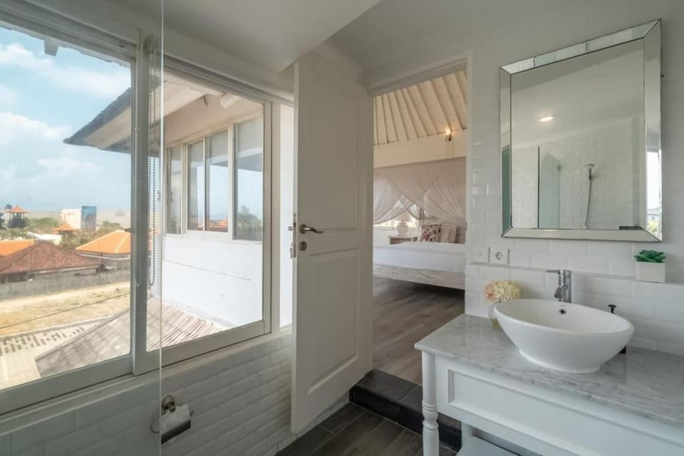 Beachside Colonial Elegance: 4BR in Canggu Villa in North Kuta
