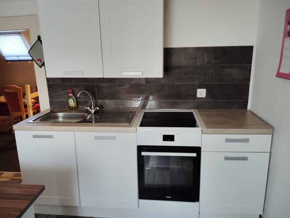 Kitchen or kitchenette, stove