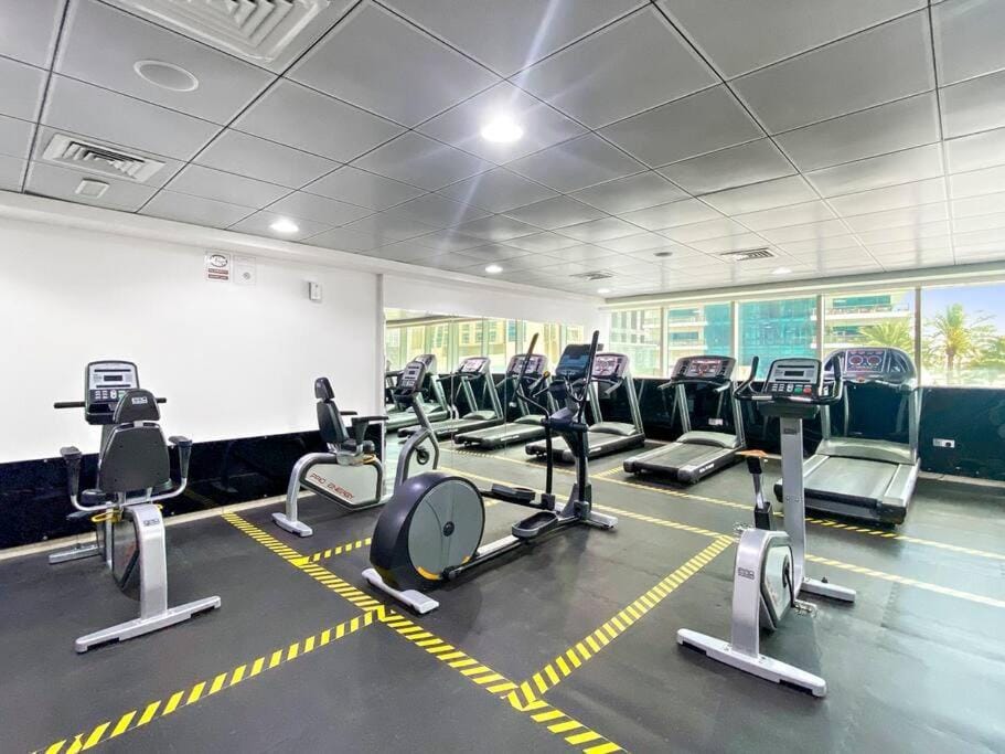 StoneTree - Furnished 1 BR Apartment Near to Tram Apartment in Dubai