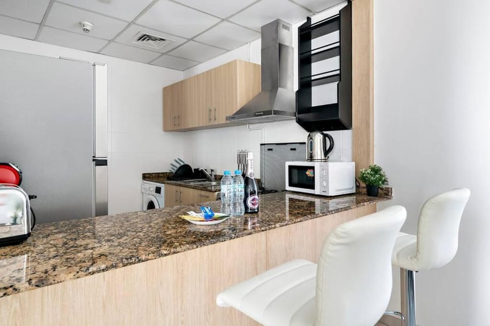 StoneTree - Furnished 1 BR Apartment Near to Tram Apartment in Dubai
