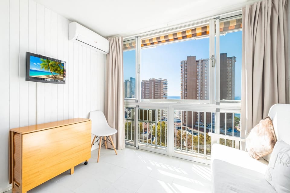 TV and multimedia, View (from property/room), Living room, Dining area, City view, air conditioner