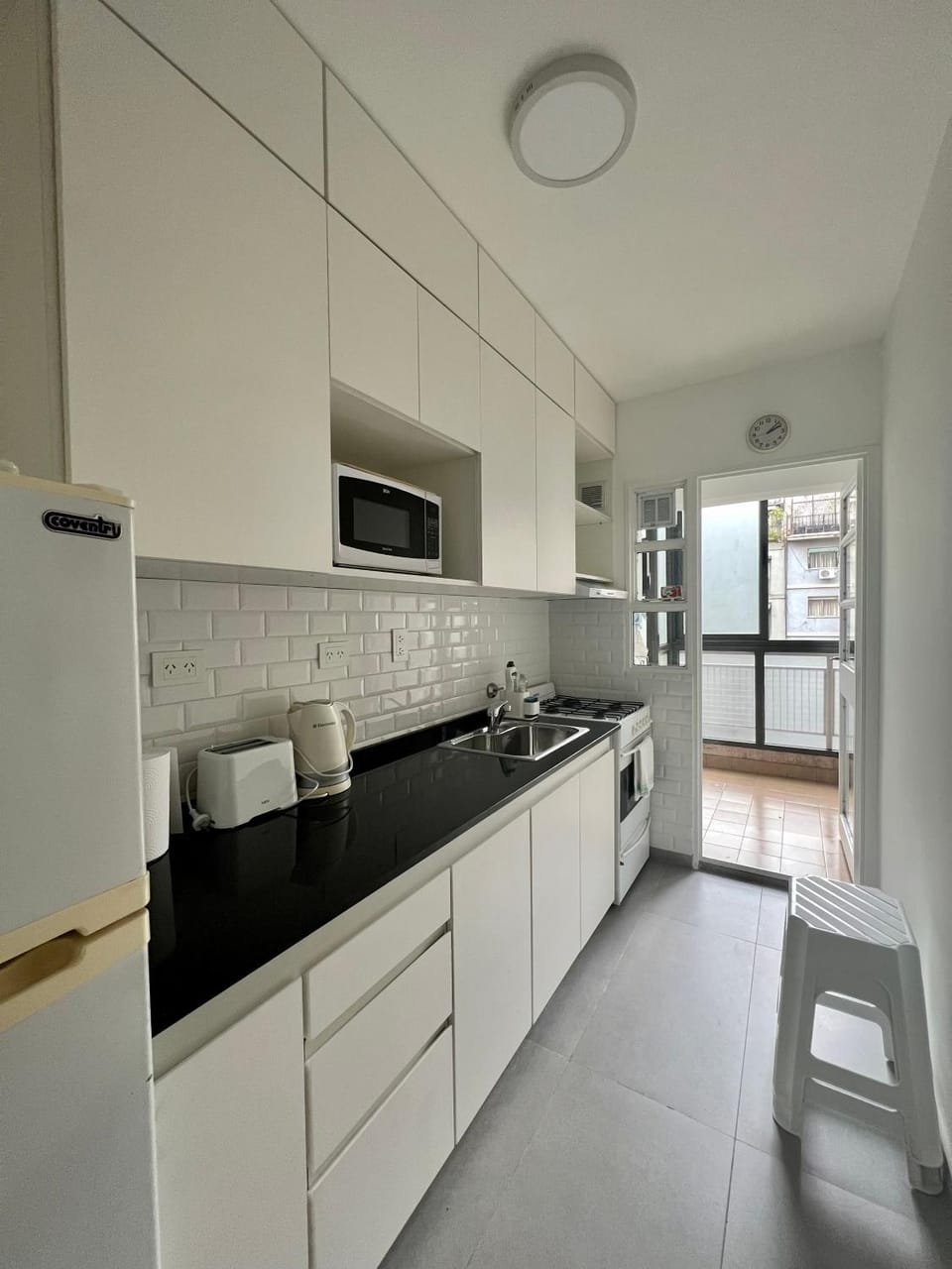 Kitchen or kitchenette, microwave, toaster