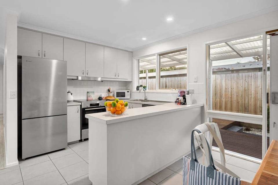 Kitchen or kitchenette, dishwasher, oven, stove