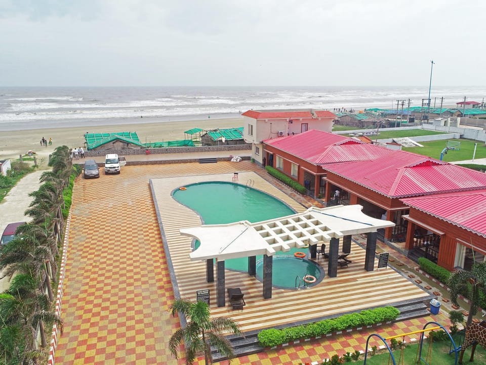 Property building, Communal lounge/ TV room, Day, Natural landscape, Bird's eye view, Beach, Evening entertainment, Pool view, Sea view, Swimming pool, Parking