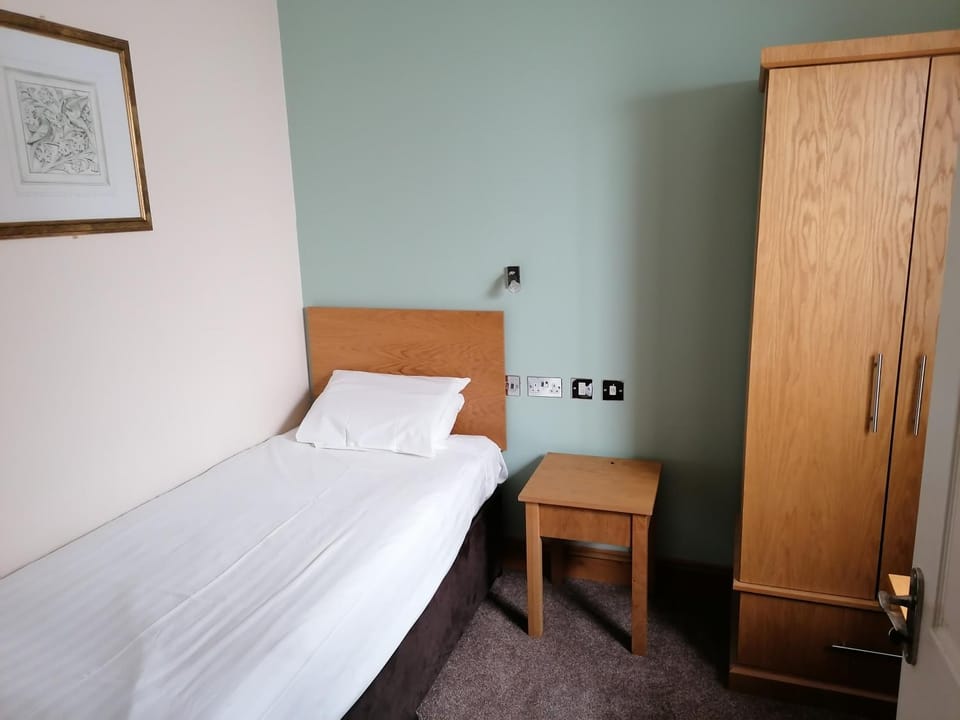 Bed, hair dresser, wardrobe