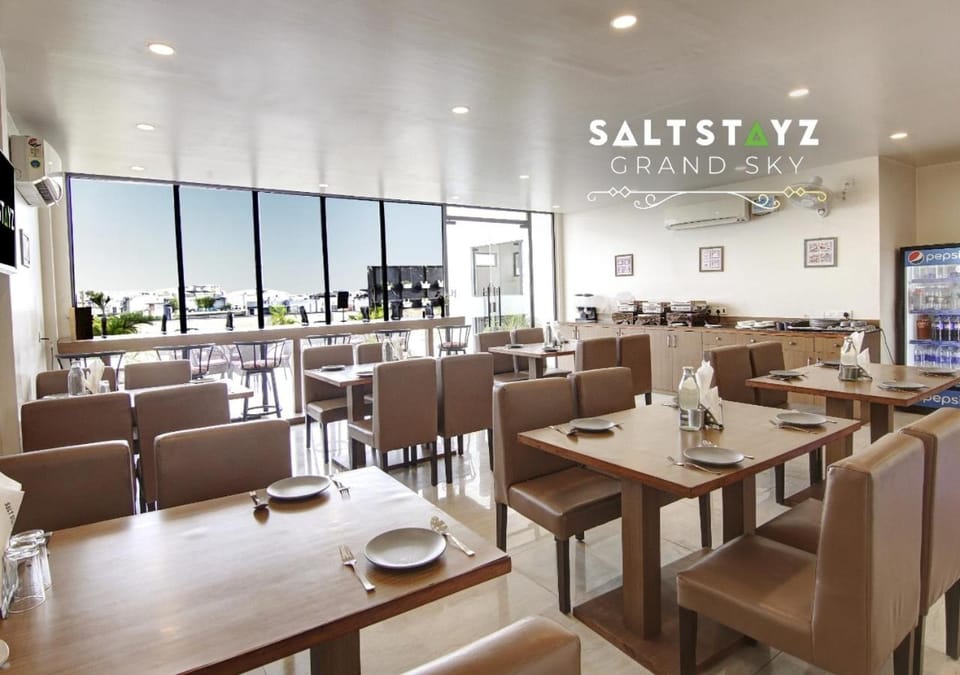Restaurant/places to eat, Property logo or sign, Decorative detail, Seating area, Dining area, air conditioner