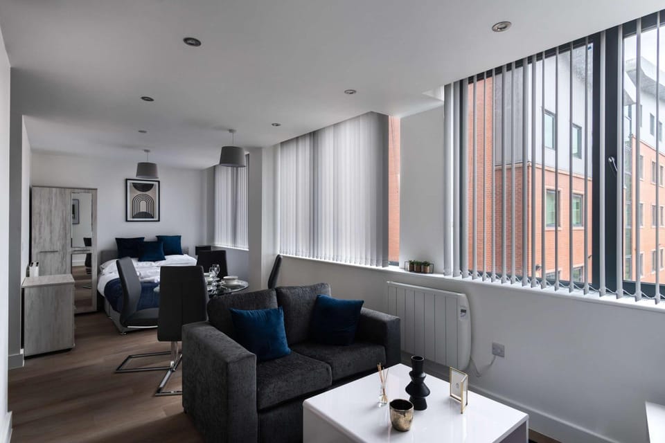 Bed, Living room, Seating area, wardrobe