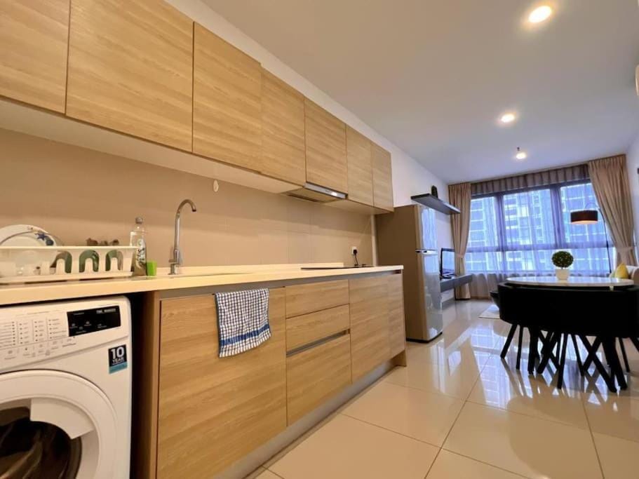 Kitchen or kitchenette, Dining area, dishwasher, stove, washing machine