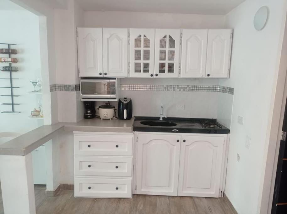 Coffee/tea facilities, Kitchen or kitchenette, minibar, stove