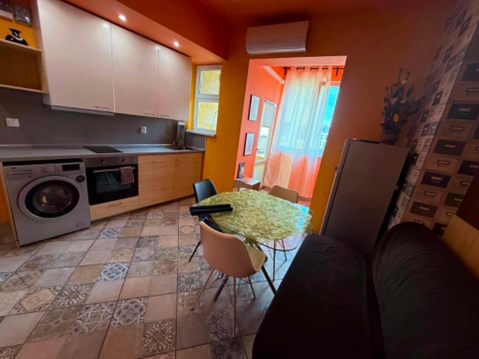 Kitchen or kitchenette, Dining area, dishwasher, oven, stove, washing machine, air conditioner