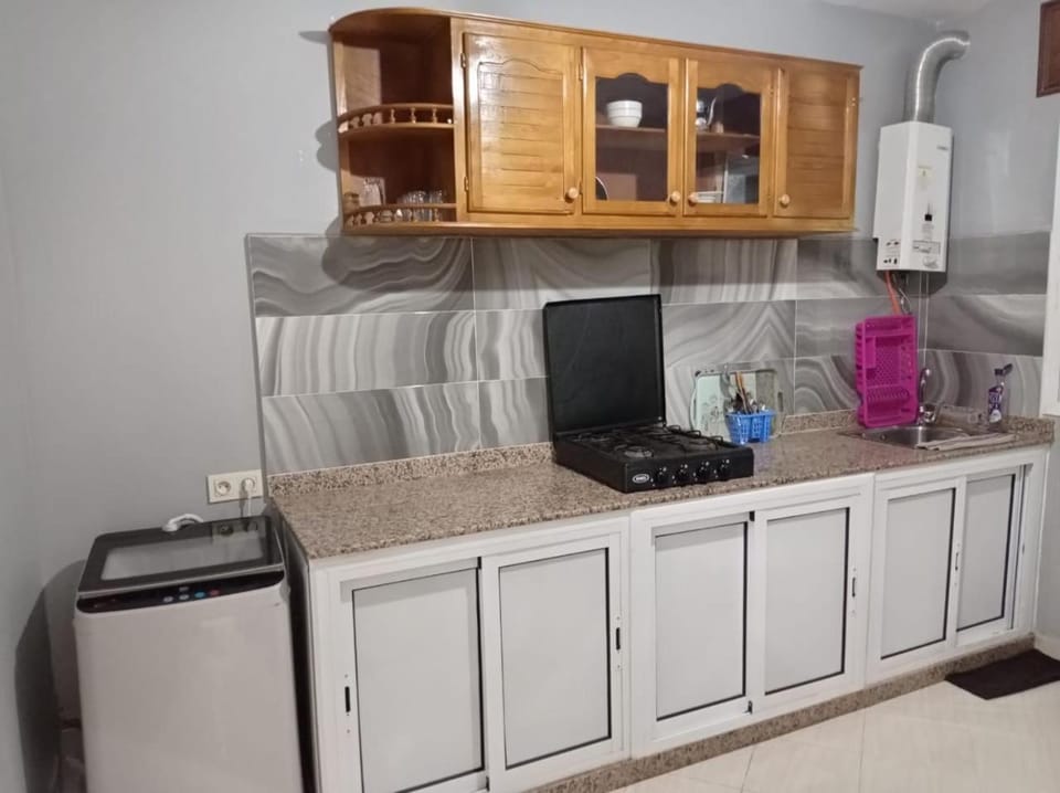 Kitchen or kitchenette, stove