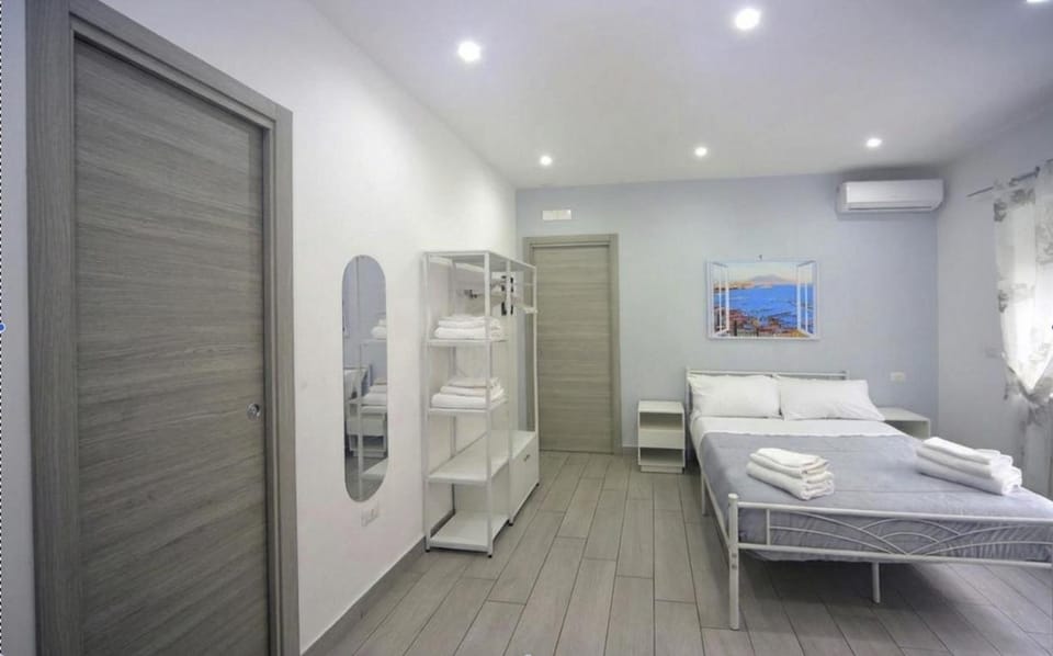 Bed, Photo of the whole room, Bedroom, towels, air conditioner