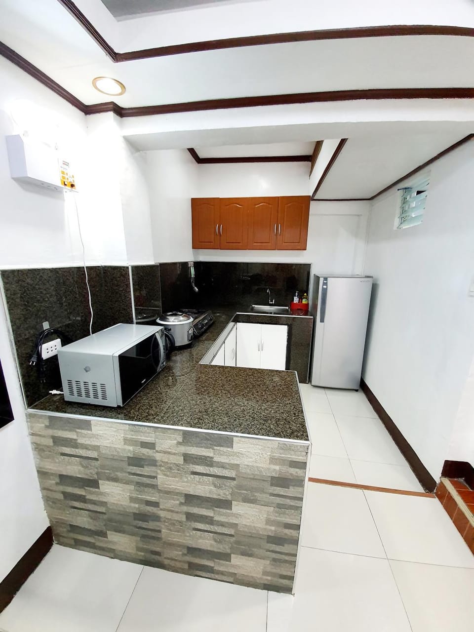 Kitchen or kitchenette, minibar, oven