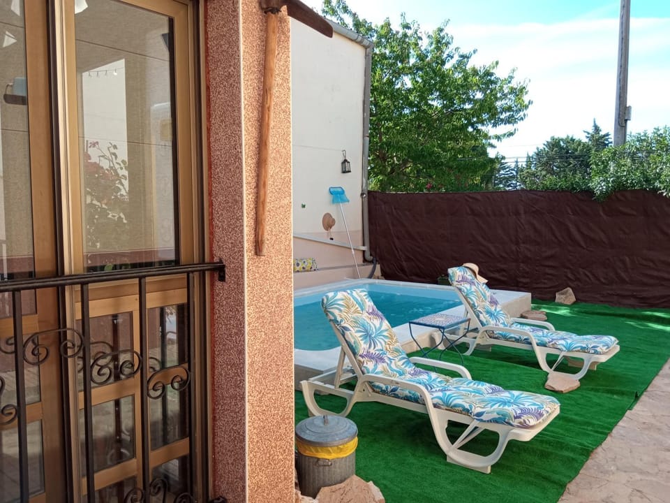 Patio, Spring, Day, Garden, View (from property/room), Garden view, Swimming pool, sunbed
